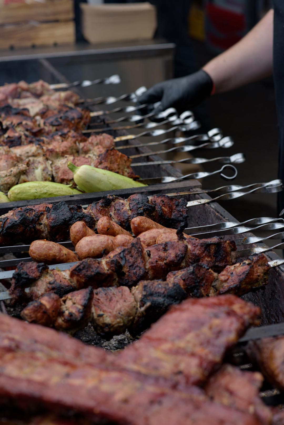 grilled-skewers-of-meat-on-the-coals-with-smoke-st-YTYJL6X.jpg